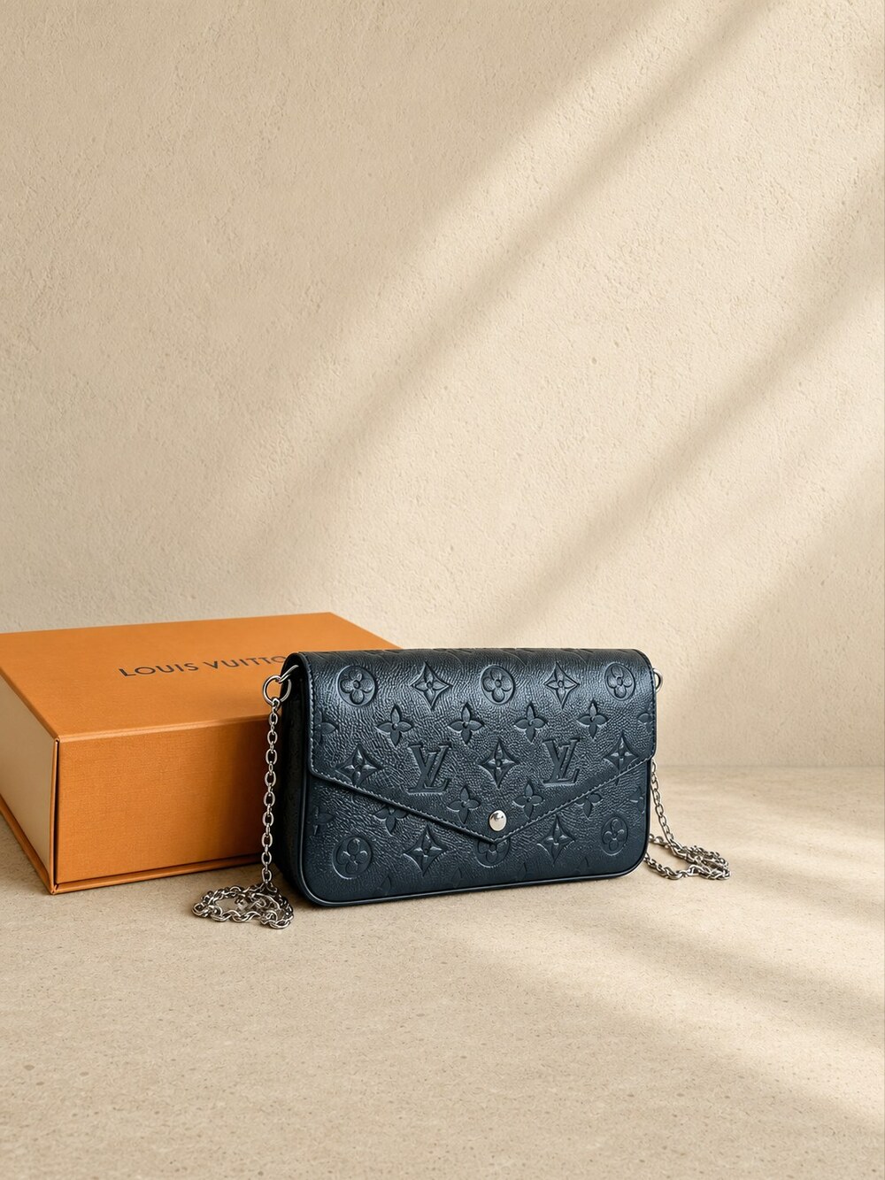 Louis Vuitton FƩlicie | Black Embossed Leather Compact Pochette
